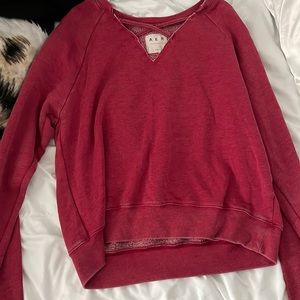 Reed Aerie sweater with cute cut out and cross over design on front